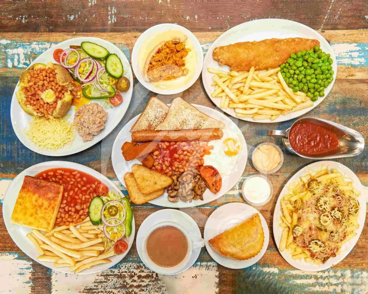 Café 1 spread: full English breakfast, fish and chips, loaded fries and a mug of tea